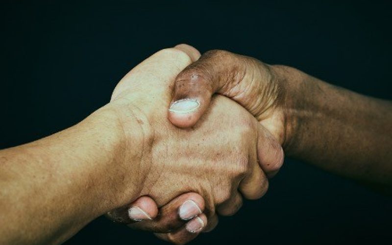 Handshake depicting collusion derailing internal controls