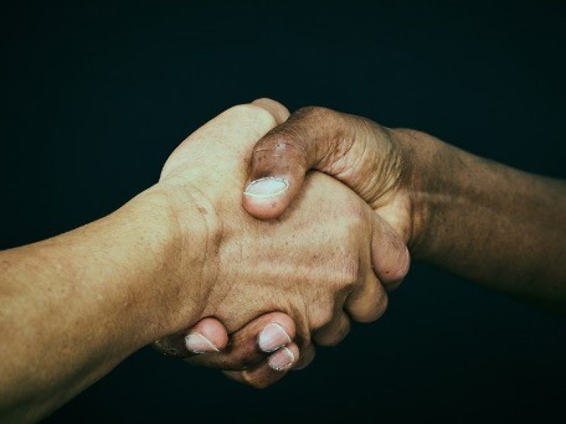 Handshake depicting collusion derailing internal controls
